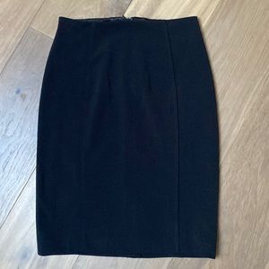 WHBM essential pencil skirt. NWT sz 2. Invisible zipper back. kick pleat back.